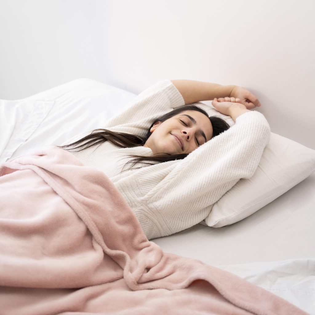 medium shot woman laying bed